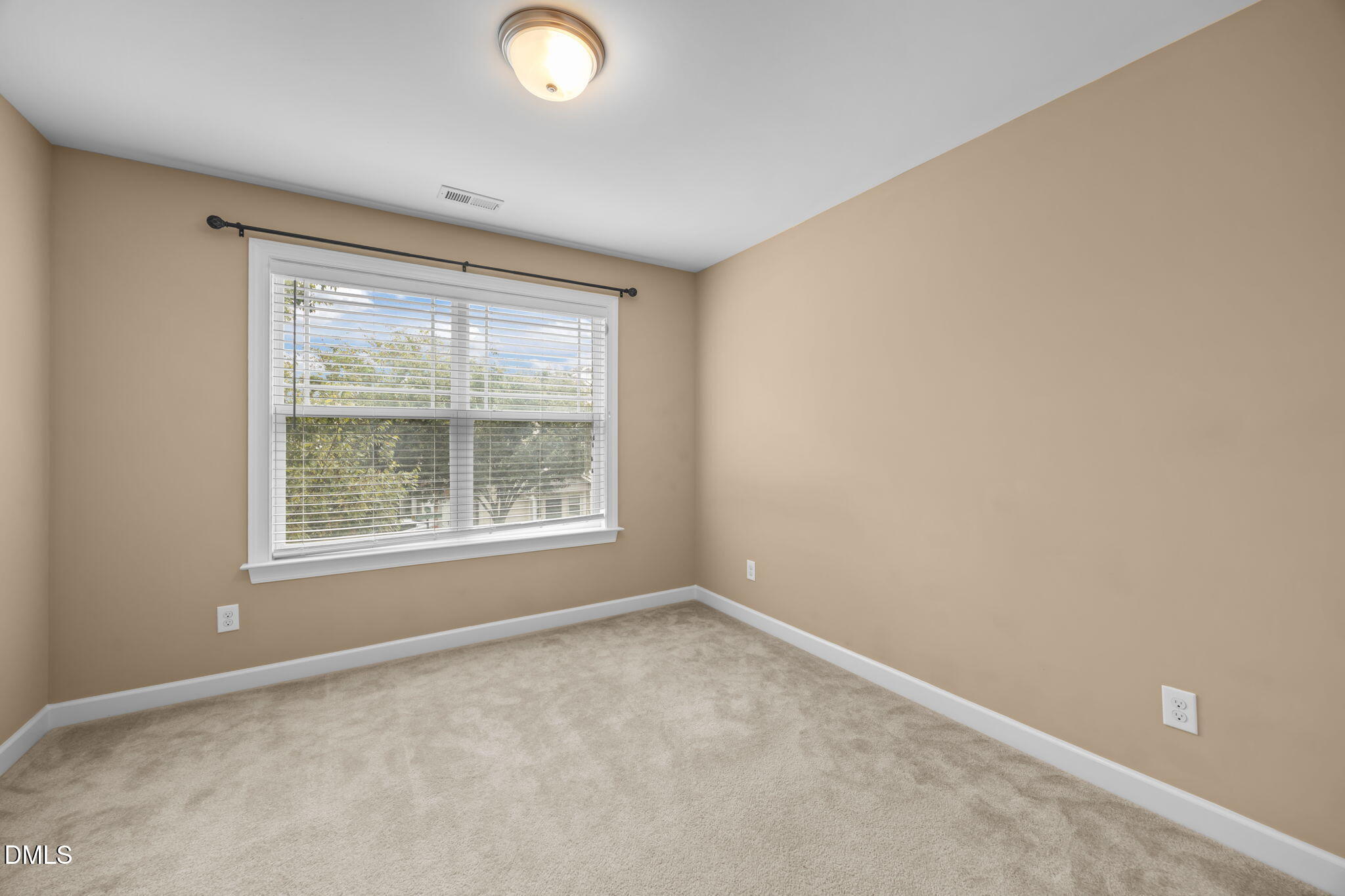 1929 Fieldhouse Avenue Raleigh, NC 27603 - Photo 20 of 29 an empty room with a window