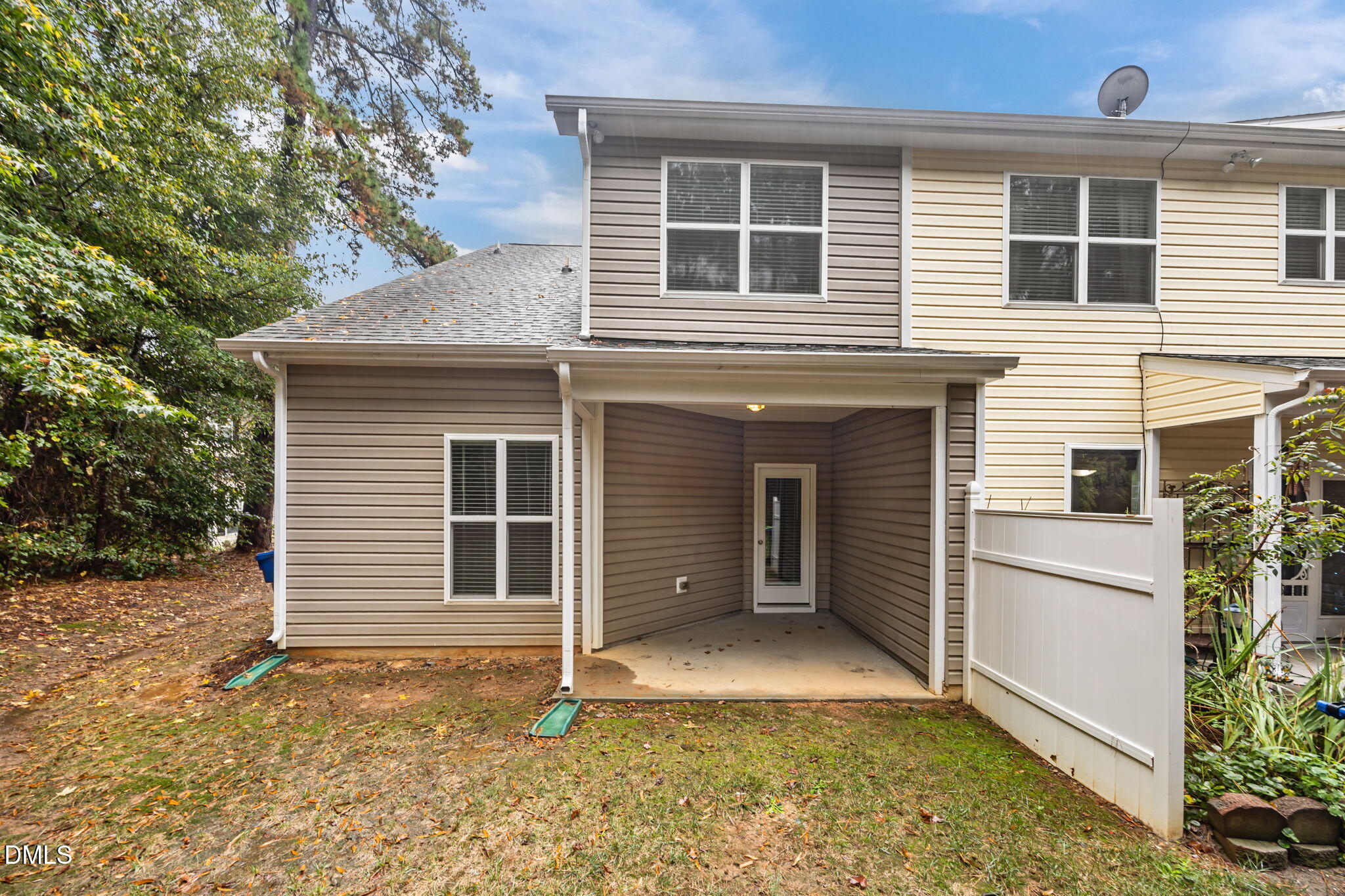 1929 Fieldhouse Avenue Raleigh, NC 27603 - Photo 23 of 29 a house with white door and wooden fence