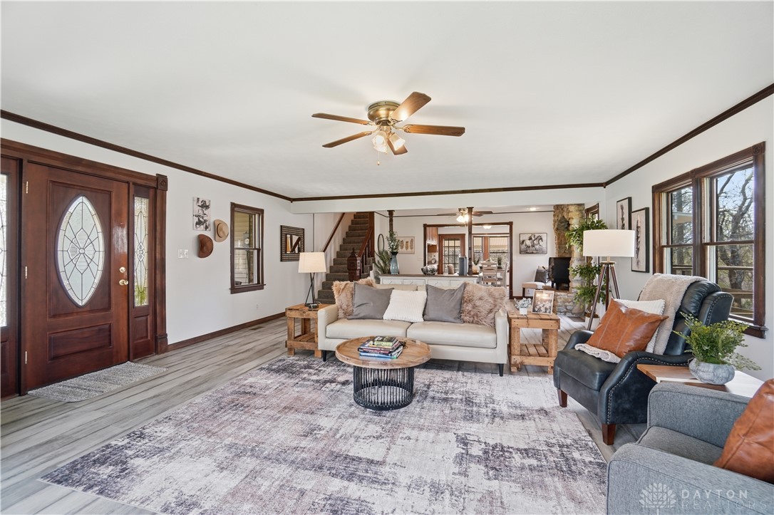 7553 Coffin Station Road Springfield, OH 45502 - Photo 24 of 95 This inviting living space features an open layout, durable flooring, and ample natural light, perfect for everyday living.