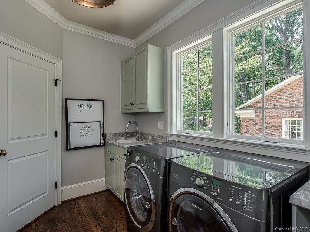 1114 Andover Road Charlotte, NC 28211 - Photo 17 of 44 a utility room with dryer and washer
