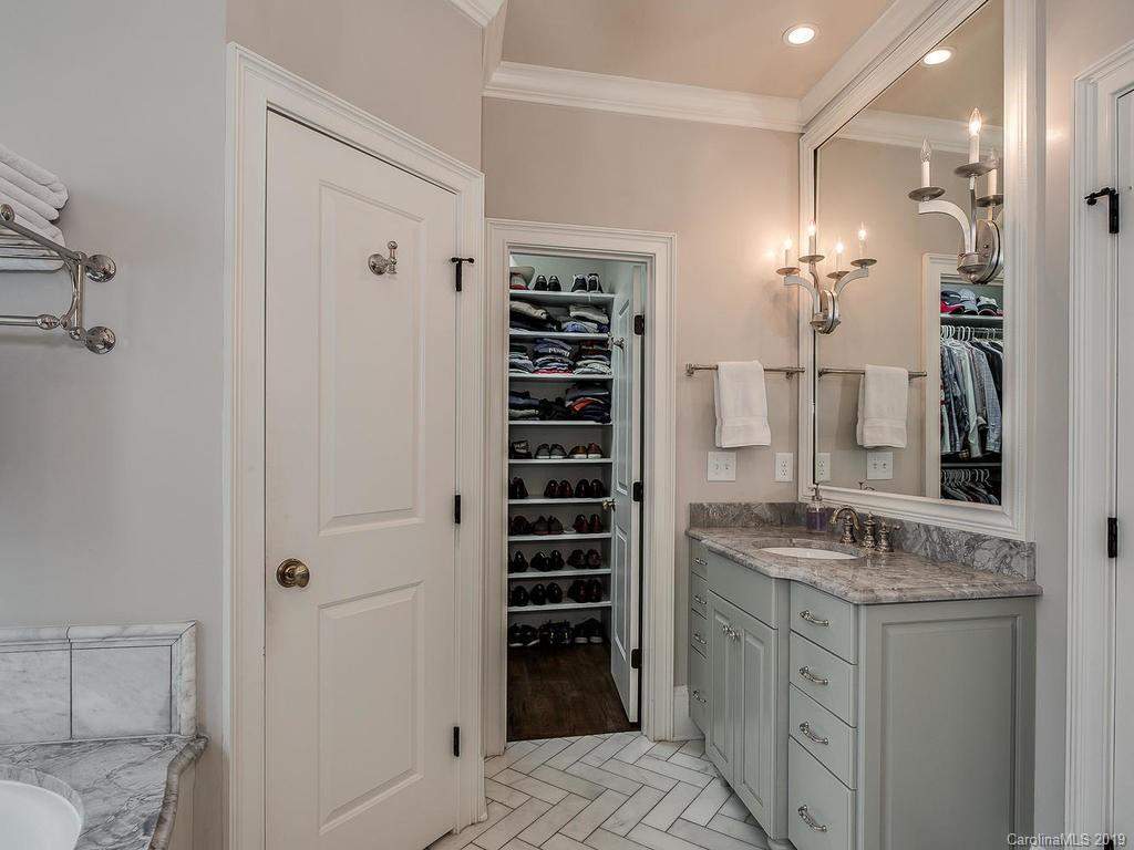 1114 Andover Road Charlotte, NC 28211 - Photo 24 of 44 a bathroom with a granite countertop sink