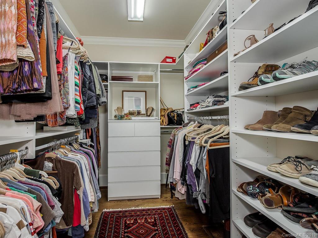 1114 Andover Road Charlotte, NC 28211 - Photo 25 of 44 a view of walk in closet with clothes and shoes