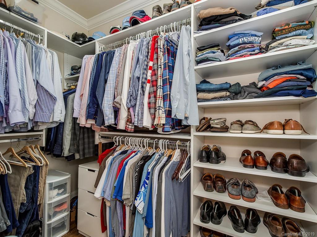 1114 Andover Road Charlotte, NC 28211 - Photo 26 of 44 a view of walk in closet with clothes and shoes
