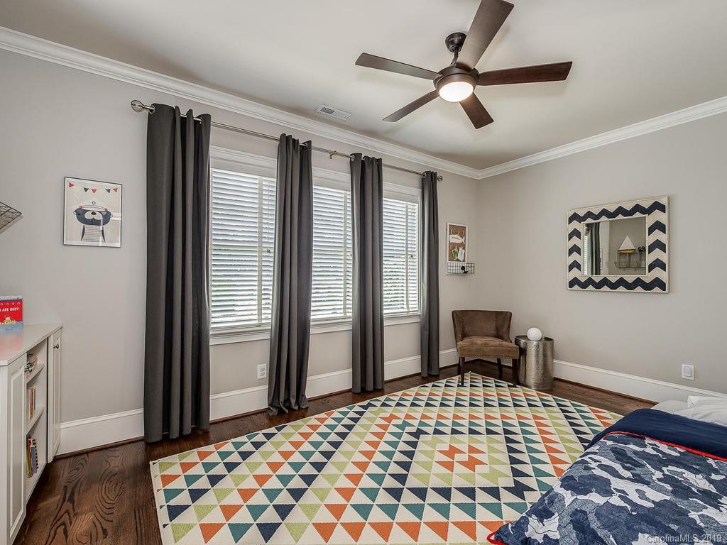 1114 Andover Road Charlotte, NC 28211 - Photo 30 of 44 a bedroom with furniture and a window