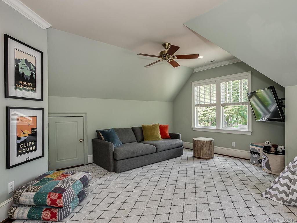 1114 Andover Road Charlotte, NC 28211 - Photo 36 of 44 a living room with furniture and a window