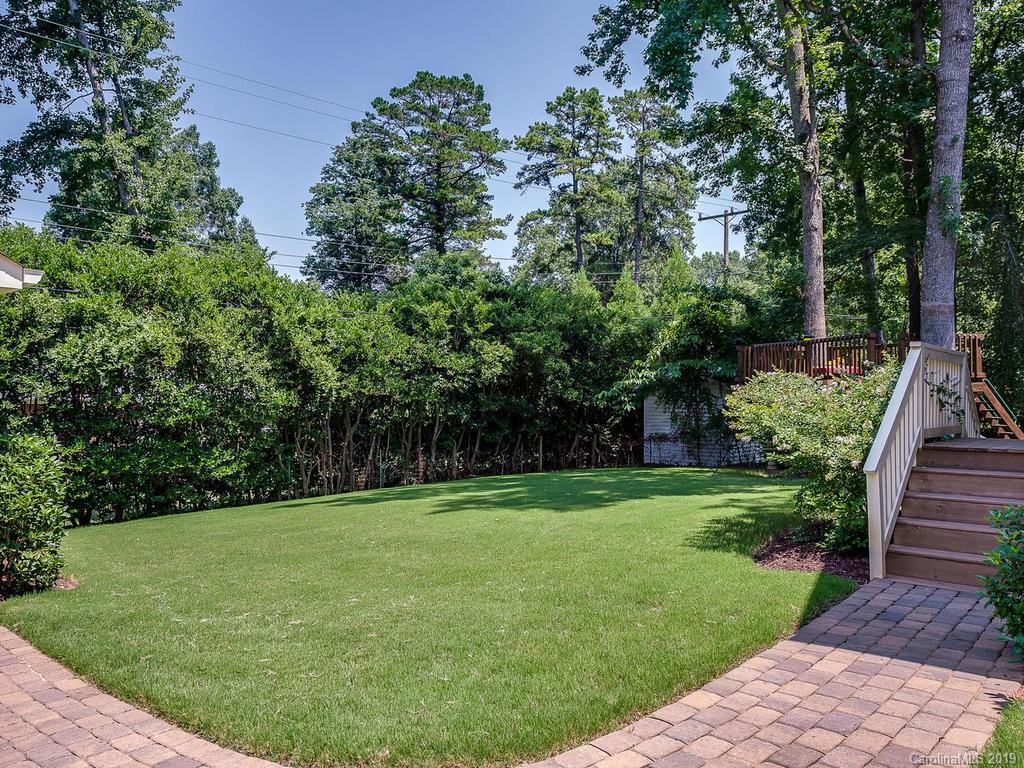 1114 Andover Road Charlotte, NC 28211 - Photo 41 of 44 a view of a backyard with large trees