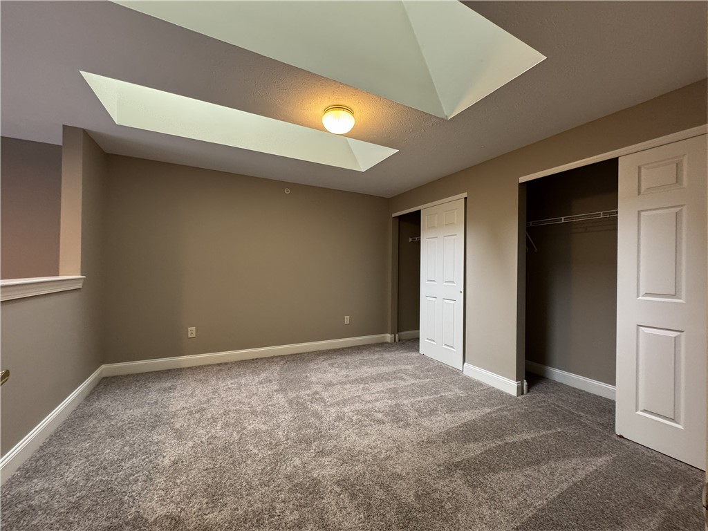 270 Exchange Boulevard, Unit 310 Rochester, NY 14608 - Photo 13 of 23 Typical large loft area with skylights and large c