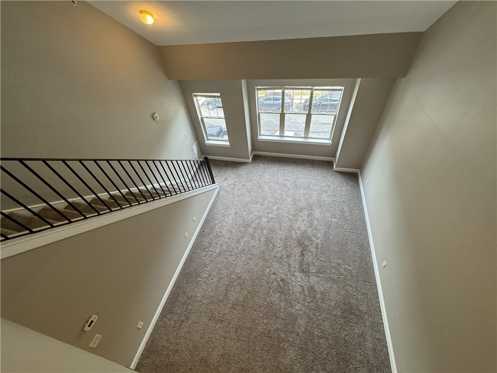 270 Exchange Boulevard, Unit 310 Rochester, NY 14608 - Photo 16 of 23 Typical view from loft area down to great room (NO
