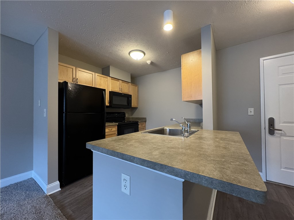 270 Exchange Boulevard, Unit 310 Rochester, NY 14608 - Photo 4 of 23 Typical kitchen view