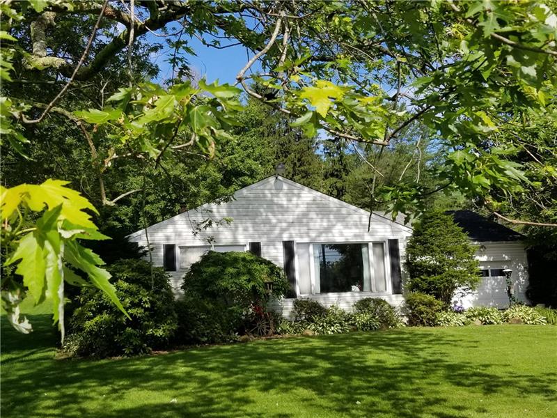Good curb appeal with large picture window. Gutter has leaf guard system in place