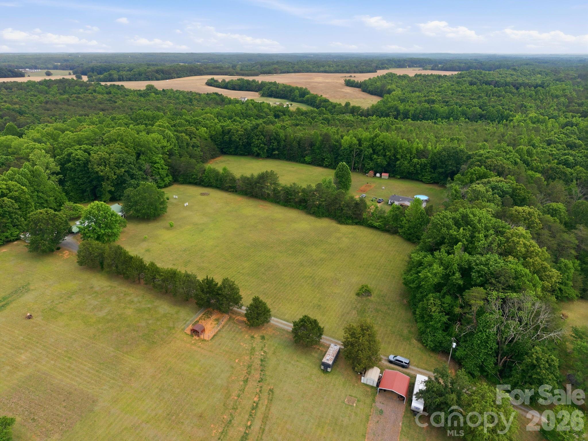 Tbd Sisk-Carter Road Rockwell, NC 28138 - Photo 10 of 14 an aerial view of ocean residential house with outdoor space and trees around