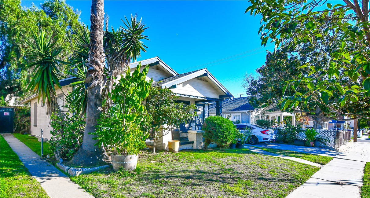 1710 Freeman Avenue Long Beach, CA 90804 - Photo 7 of 7 a house with a tree in front of it