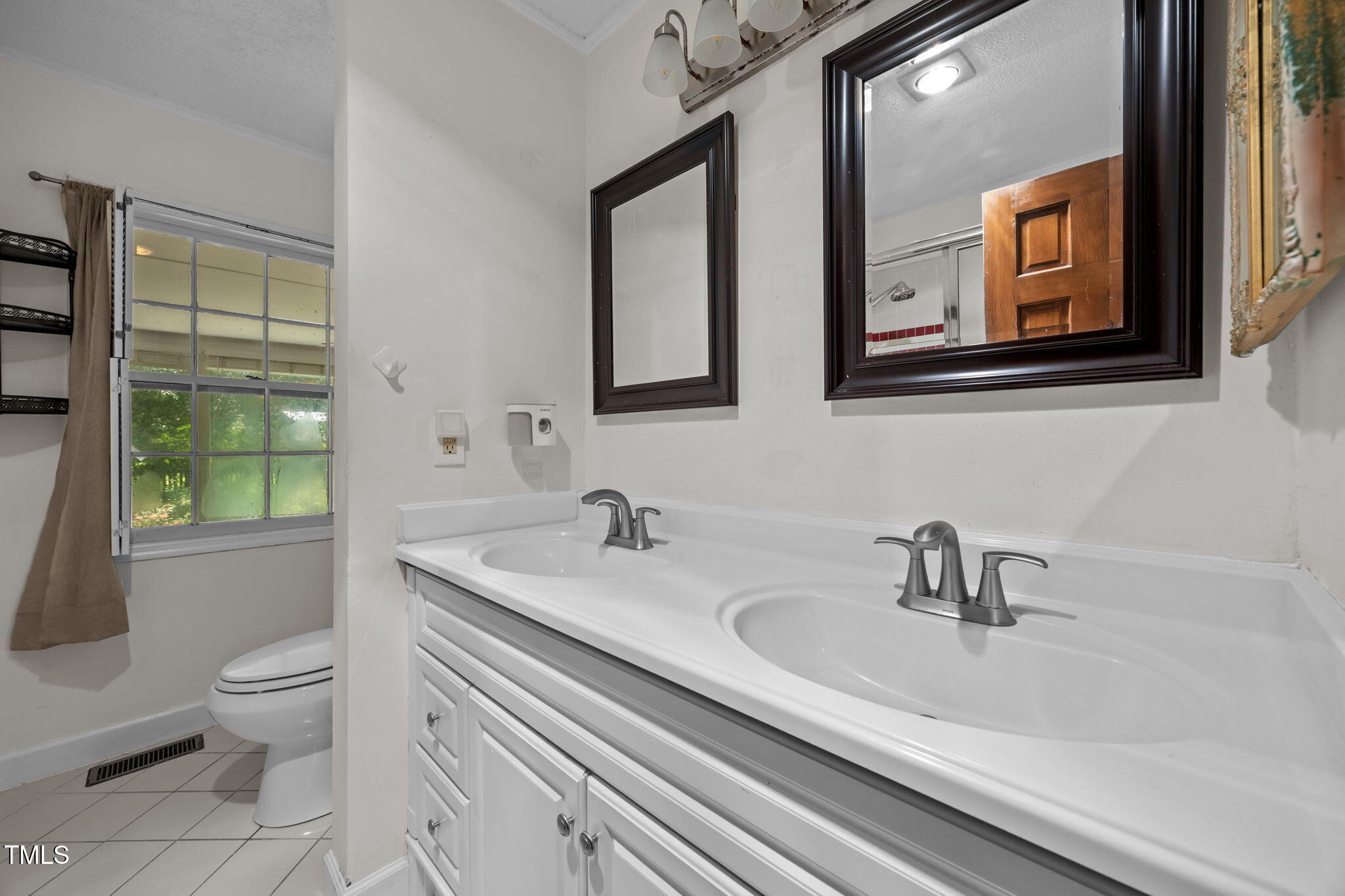 1413 Bud Hawkins Road Dunn, NC 28334 - Photo 26 of 51 Dual vanity in hall bath.