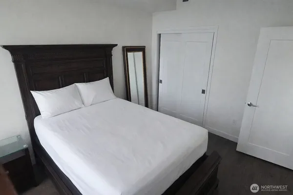 a bathroom with a sink mirror toilet and bathtub