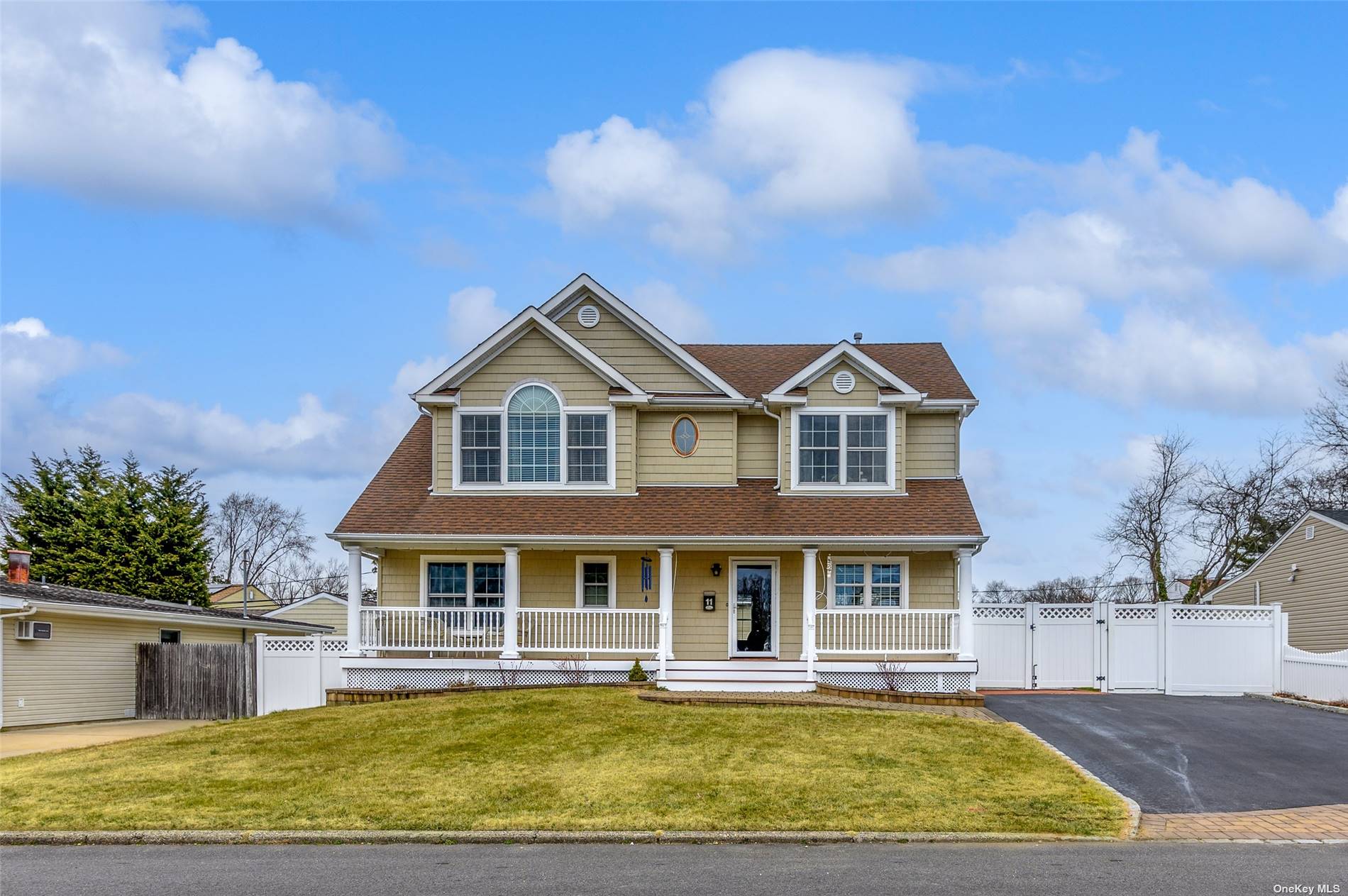 11 Bertram Street Islip, NY 11751 - Photo 1 of 1 a front view of a house with a yard