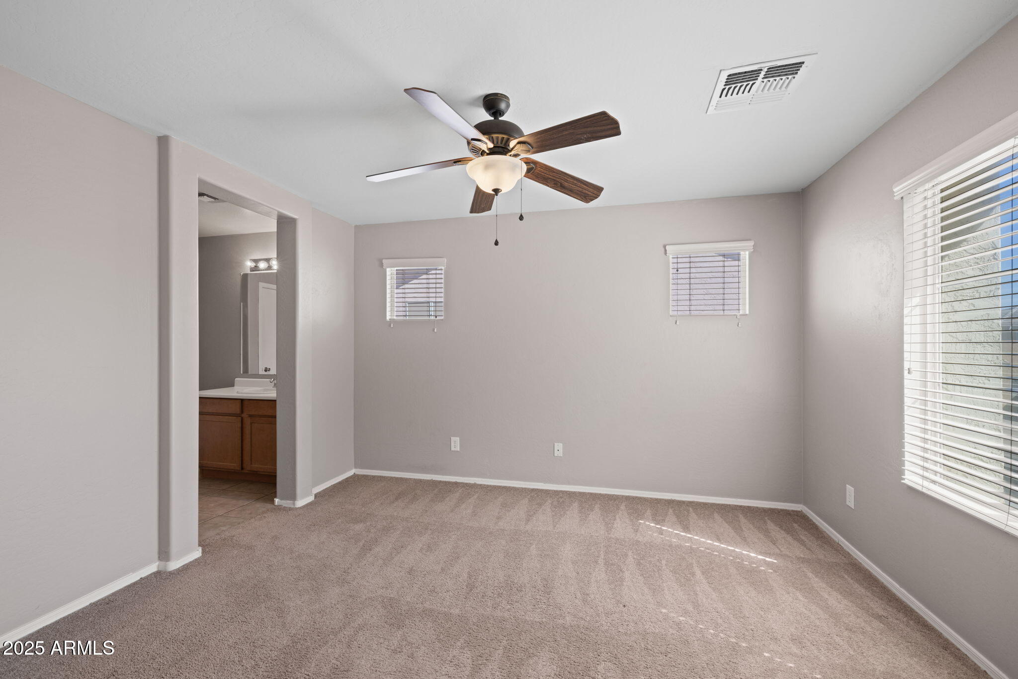5312 Fulton Street Phoenix, AZ 85043 - Photo 18 of 26 a view of an empty room with a window