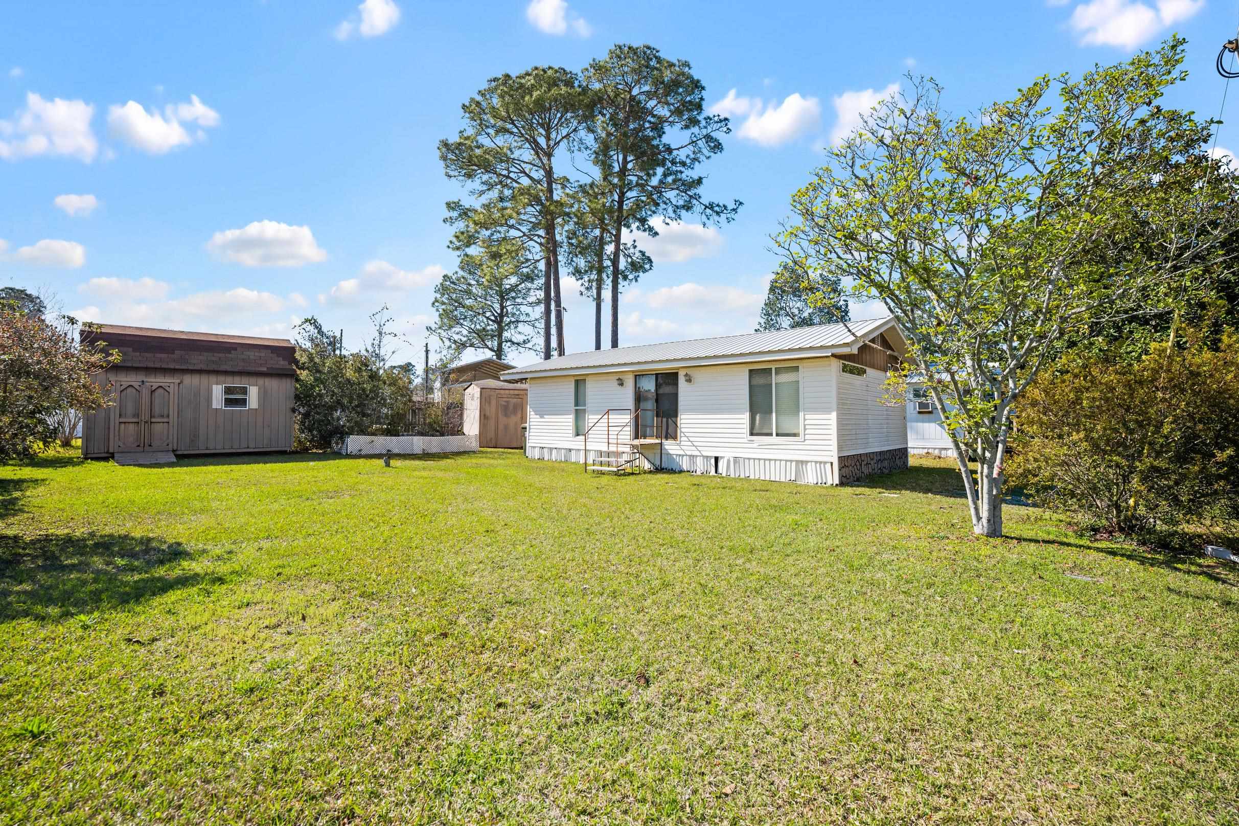 681 Escambia Loop Lillian, AL 36549 - Photo 16 of 34 Back Of Structure