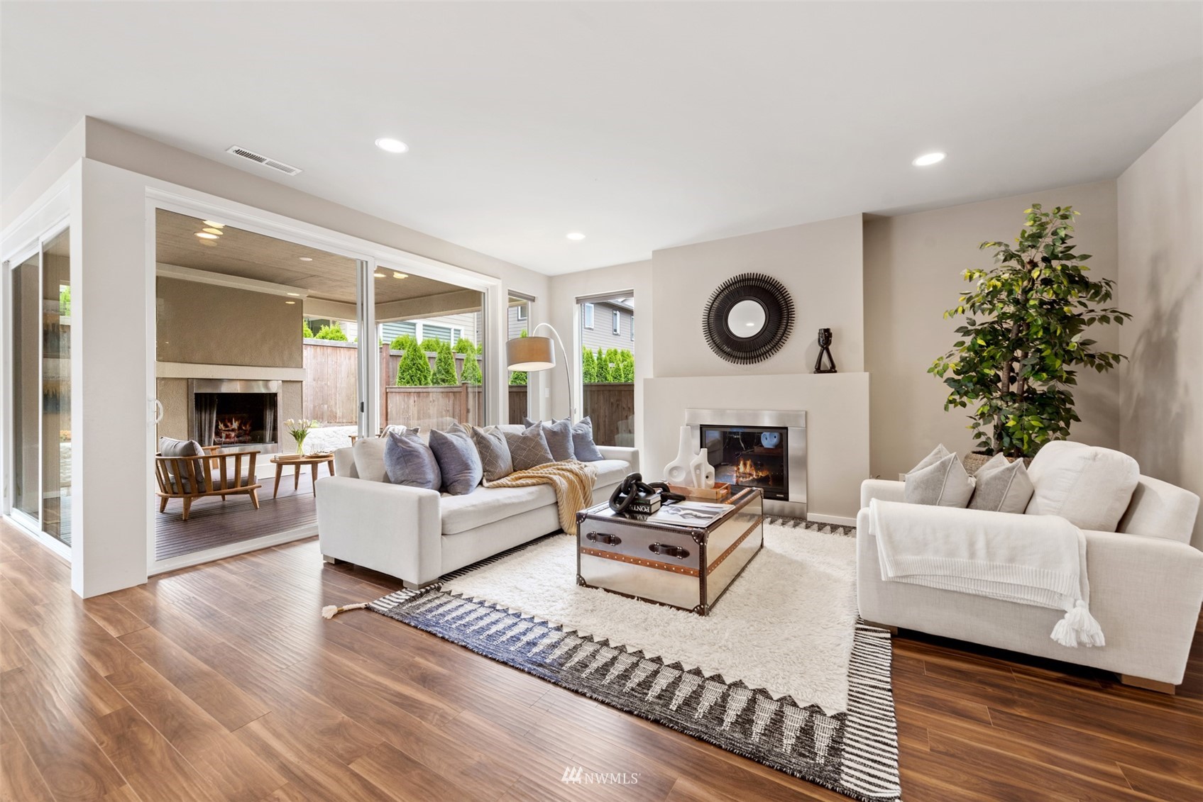 17007 40th Avenue Southeast Bothell, WA 98012 - Photo 3 of 26 a living room with furniture and a fireplace