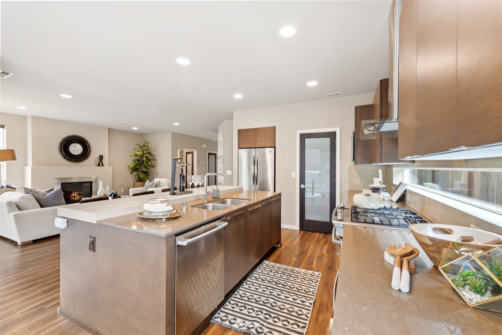 17007 40th Avenue Southeast Bothell, WA 98012 - Photo 8 of 26 a room with stainless steel appliances kitchen island granite countertop a sink and cabinets