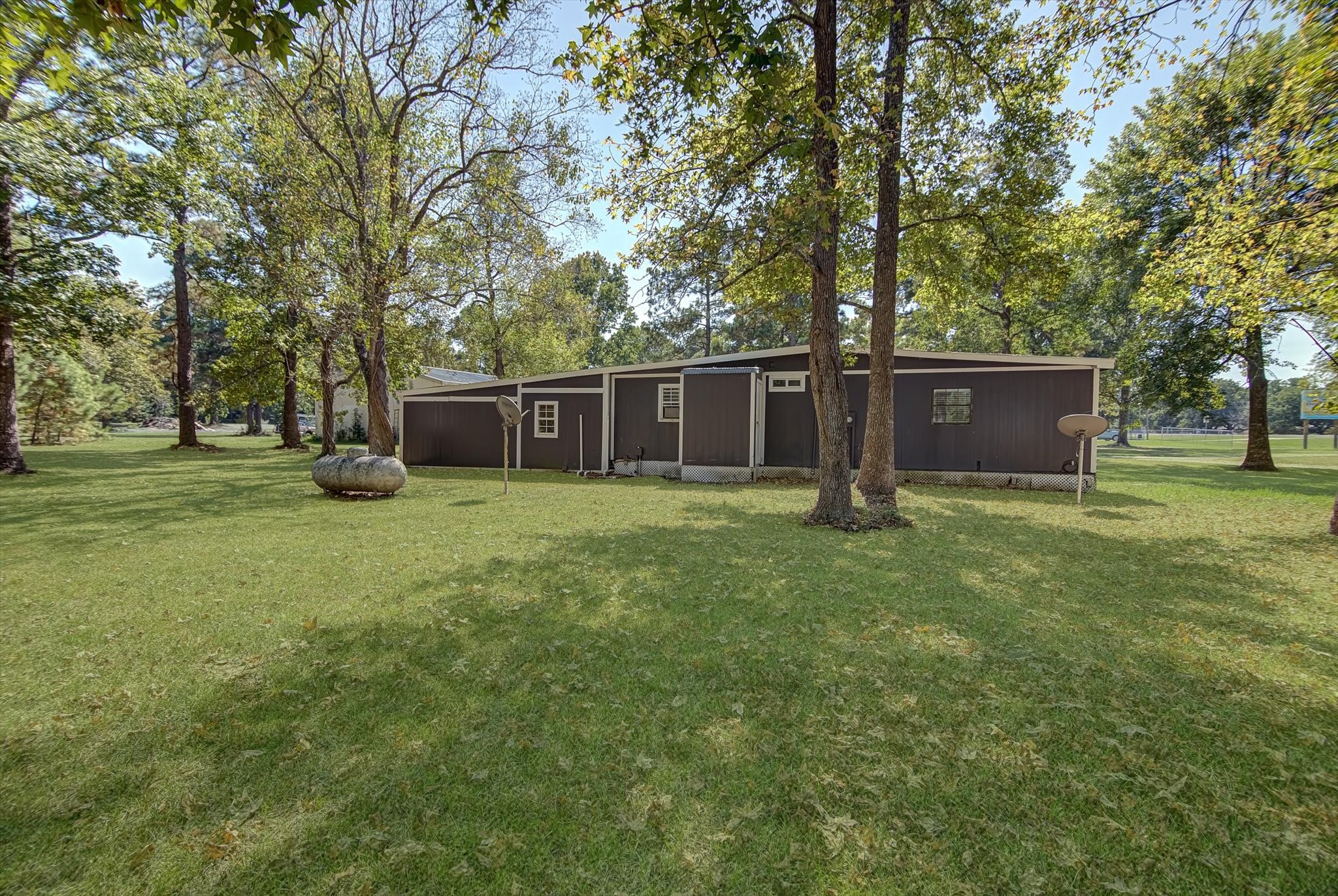 14752 Highway 146 Liberty, TX 77575 - Photo 22 of 31 front view of a house with yard