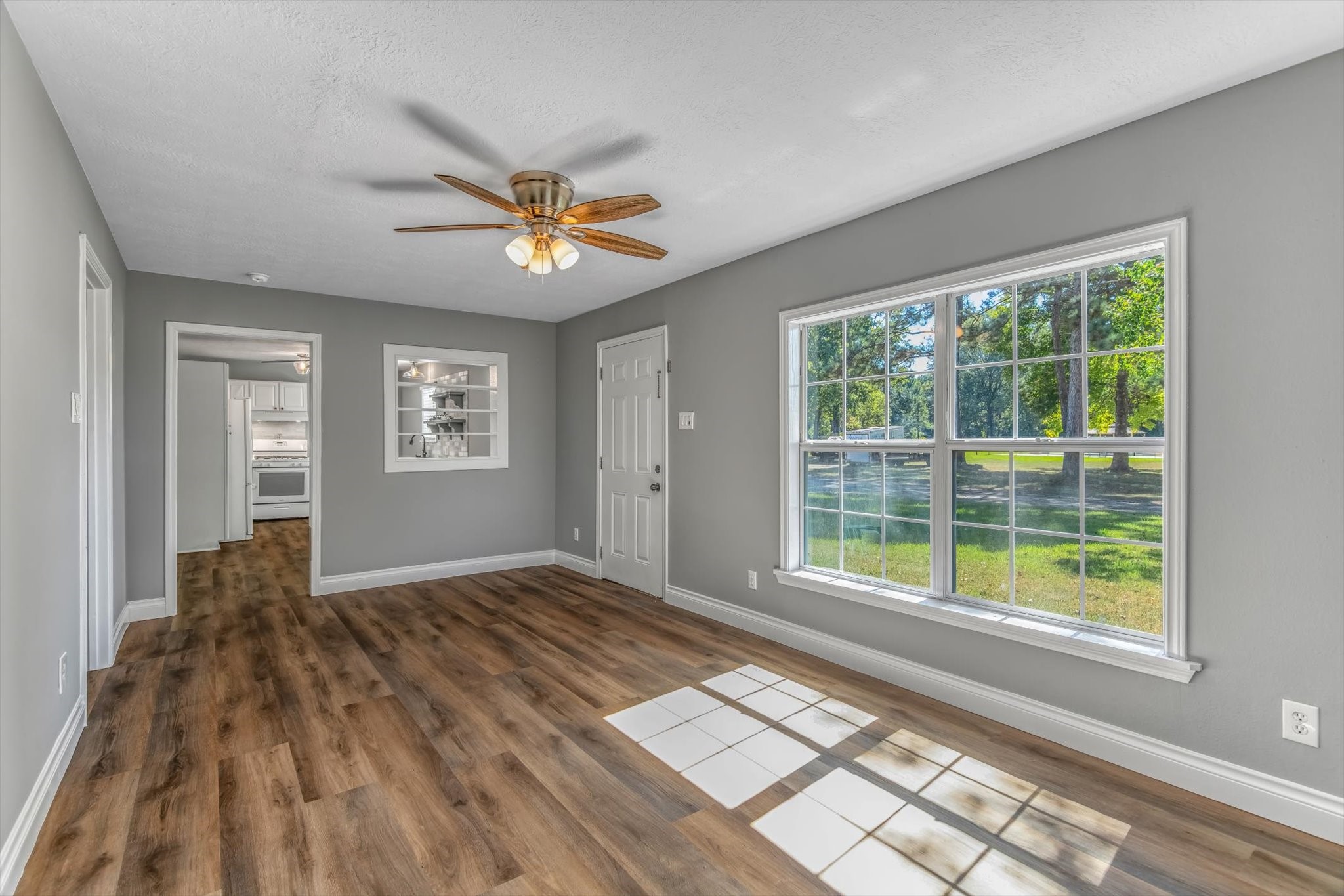 14752 Highway 146 Liberty, TX 77575 - Photo 6 of 31 a view of an empty room with a window
