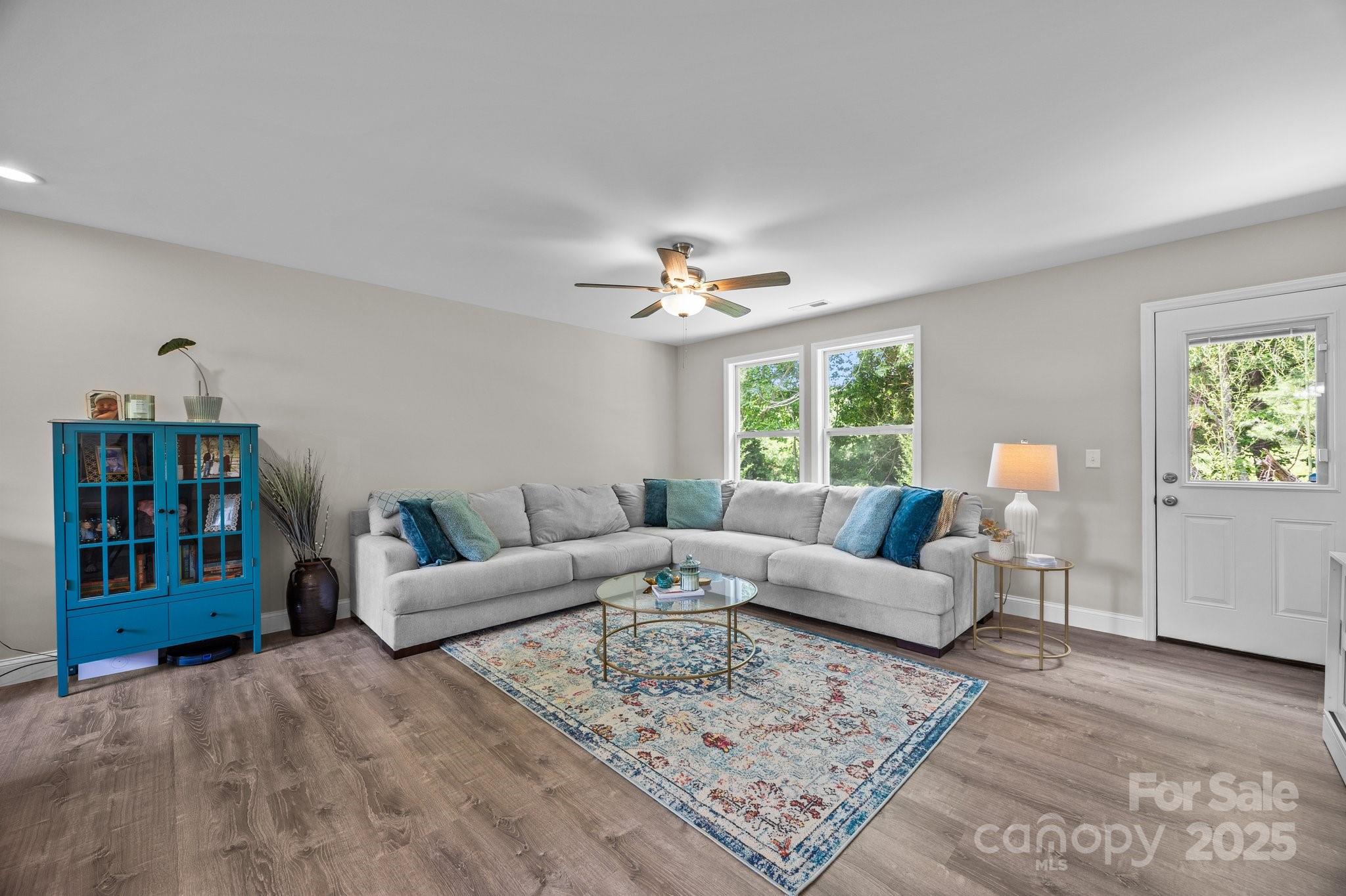 458 Summer Road Hendersonville, NC 28792 - Photo 12 of 29 a living room with furniture and a window
