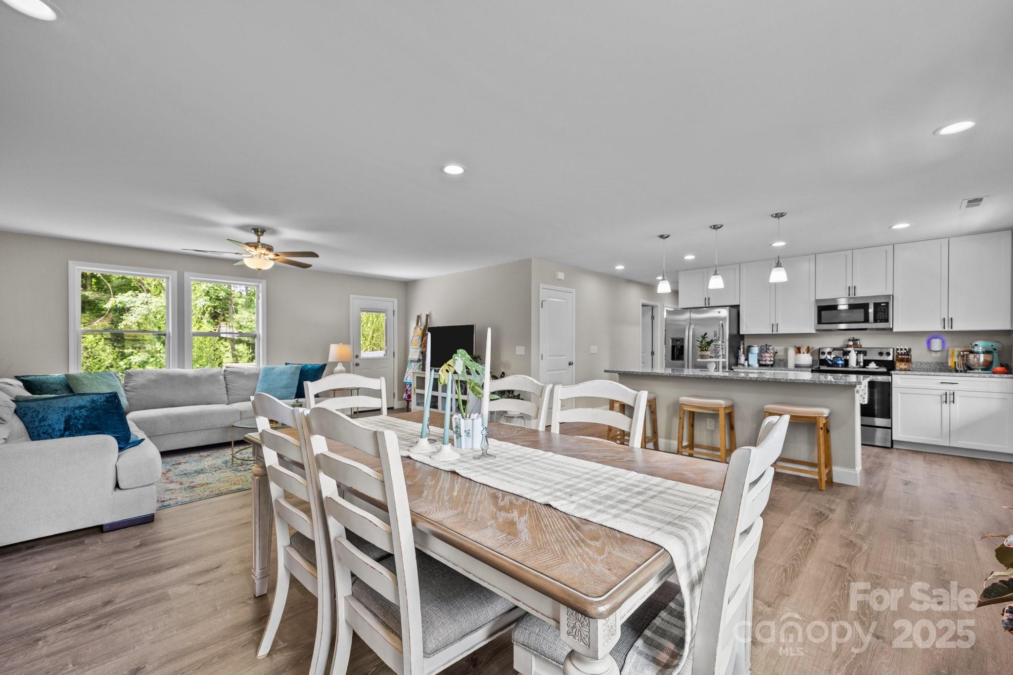 458 Summer Road Hendersonville, NC 28792 - Photo 15 of 29 a view of a dining room with furniture