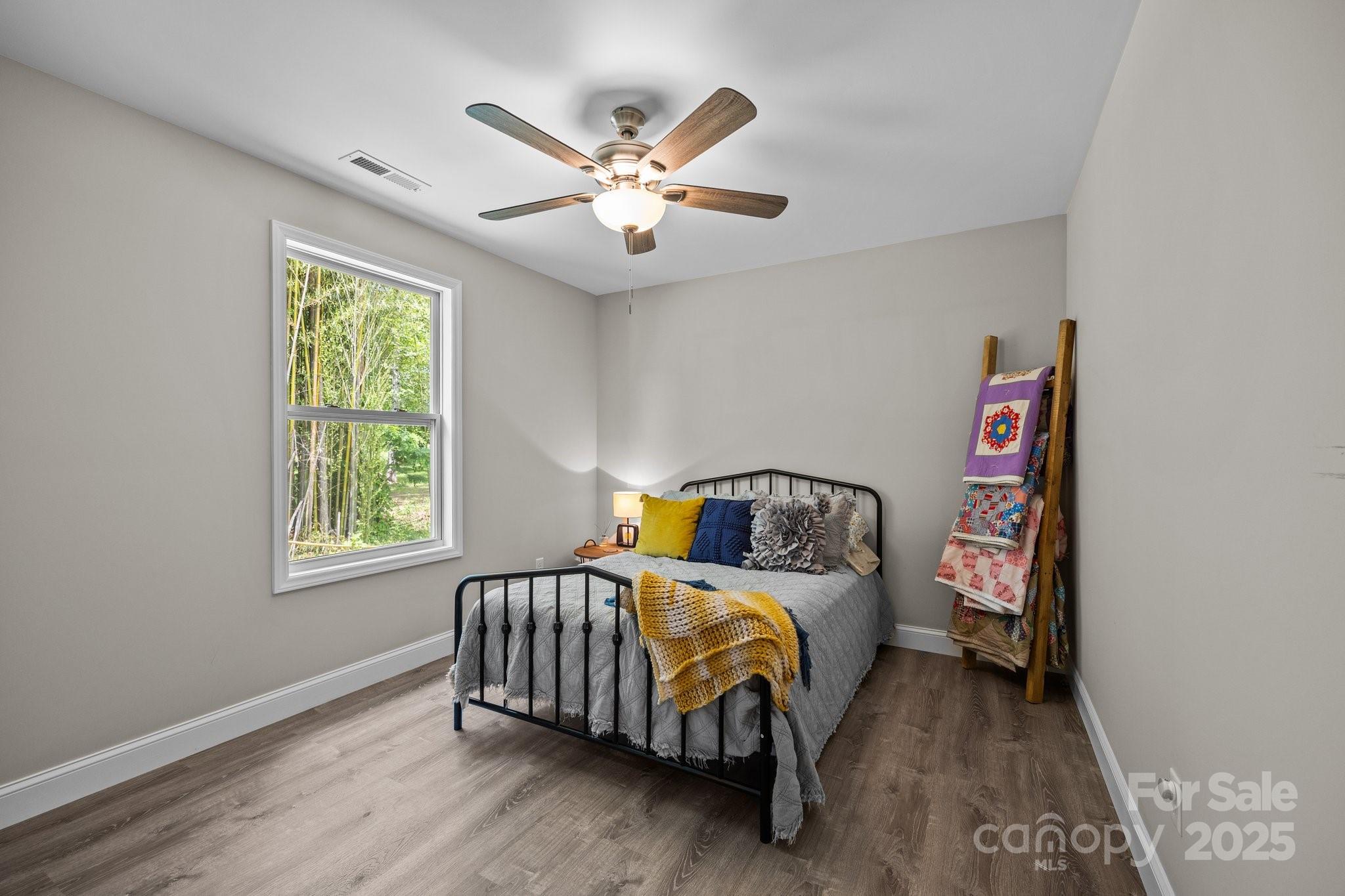 458 Summer Road Hendersonville, NC 28792 - Photo 20 of 29 a bed room with a bed and a window
