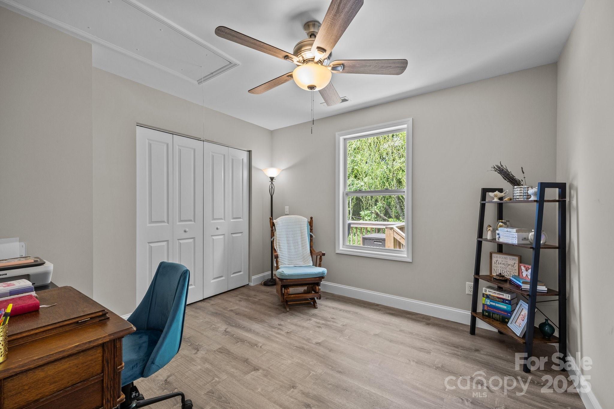 458 Summer Road Hendersonville, NC 28792 - Photo 23 of 29 a living room with furniture and a window