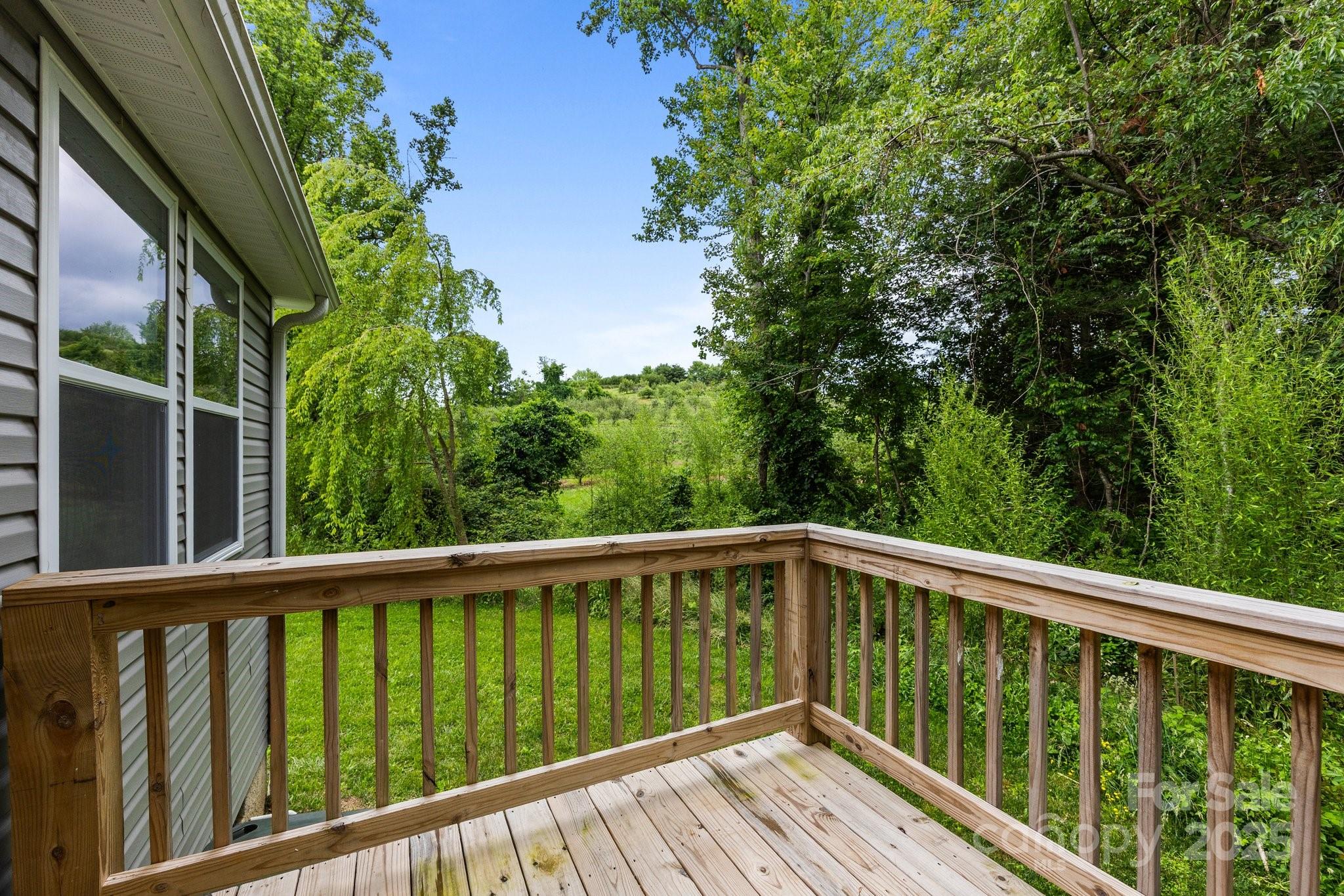 458 Summer Road Hendersonville, NC 28792 - Photo 26 of 29 a view of balcony with deck and wooden floor
