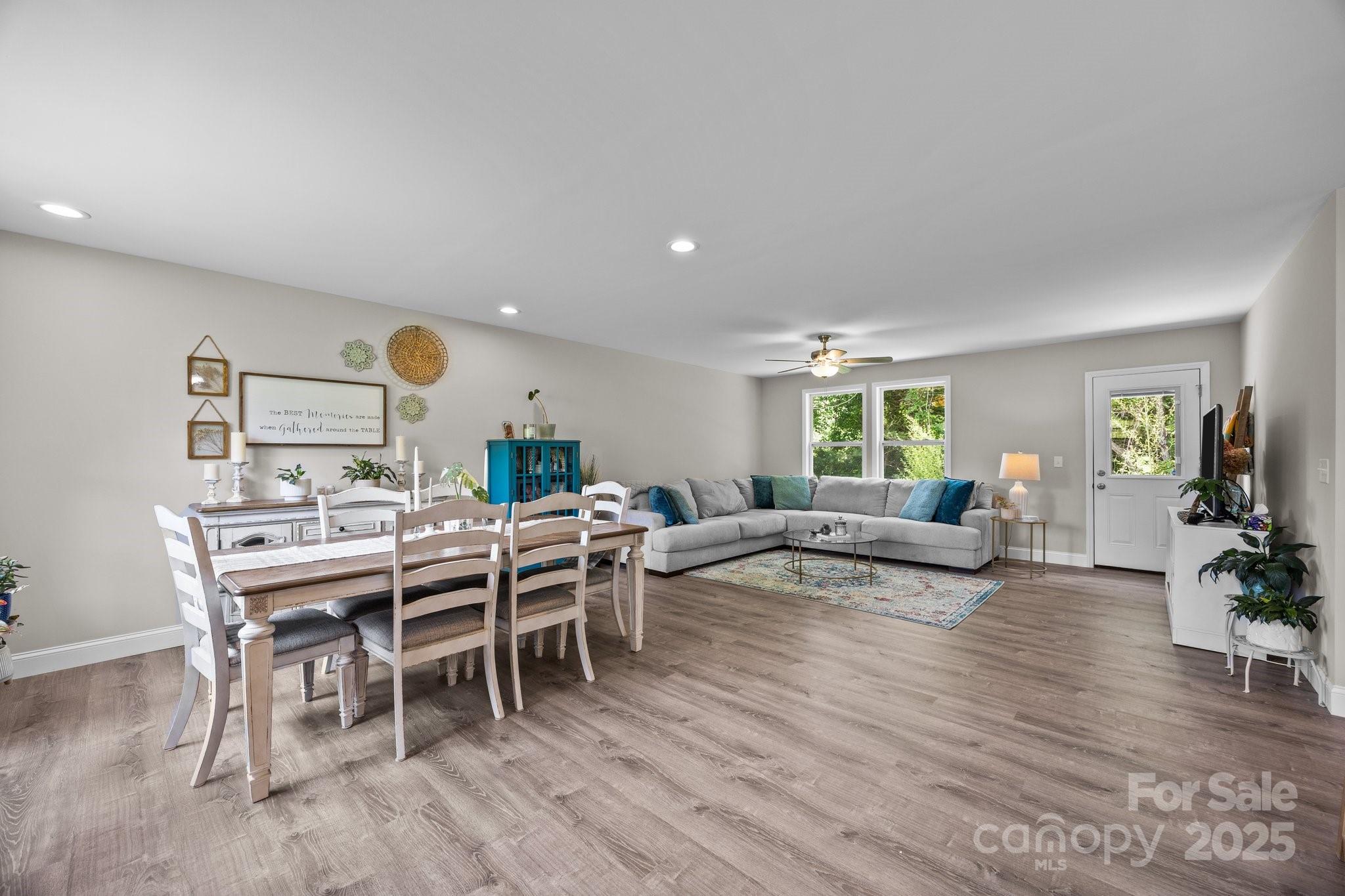 458 Summer Road Hendersonville, NC 28792 - Photo 6 of 29 a view of a dining room with furniture and wooden floor