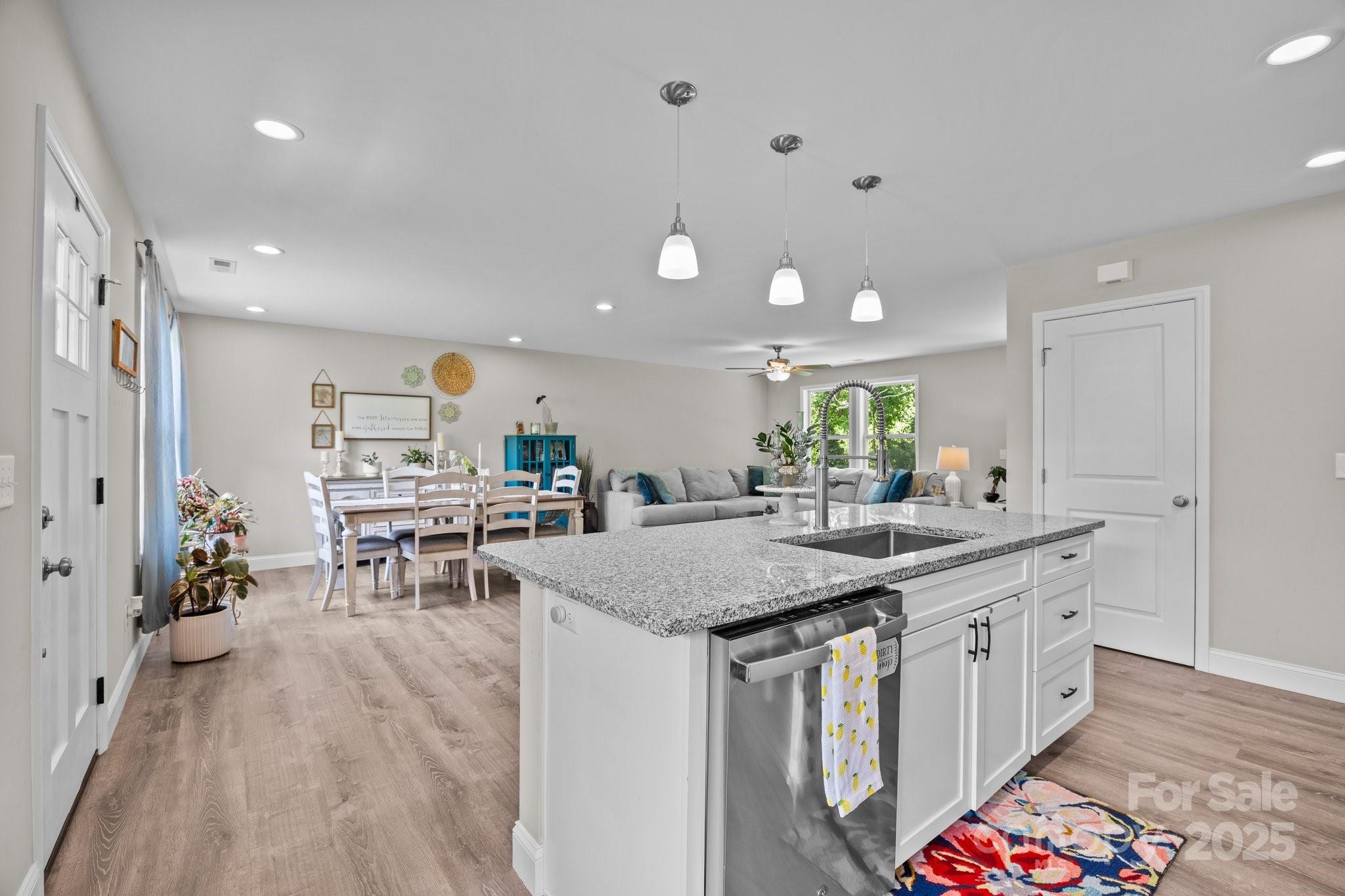 458 Summer Road Hendersonville, NC 28792 - Photo 10 of 29 a kitchen with counter space dining table and chairs