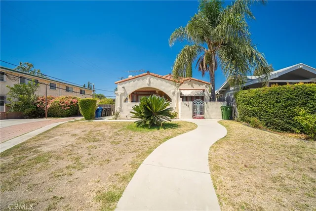 a view of a garden with a pathway