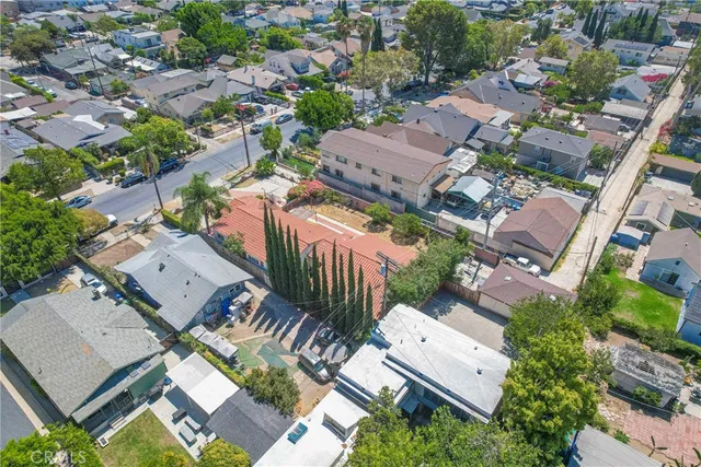 an aerial view of a house with a outdoor space