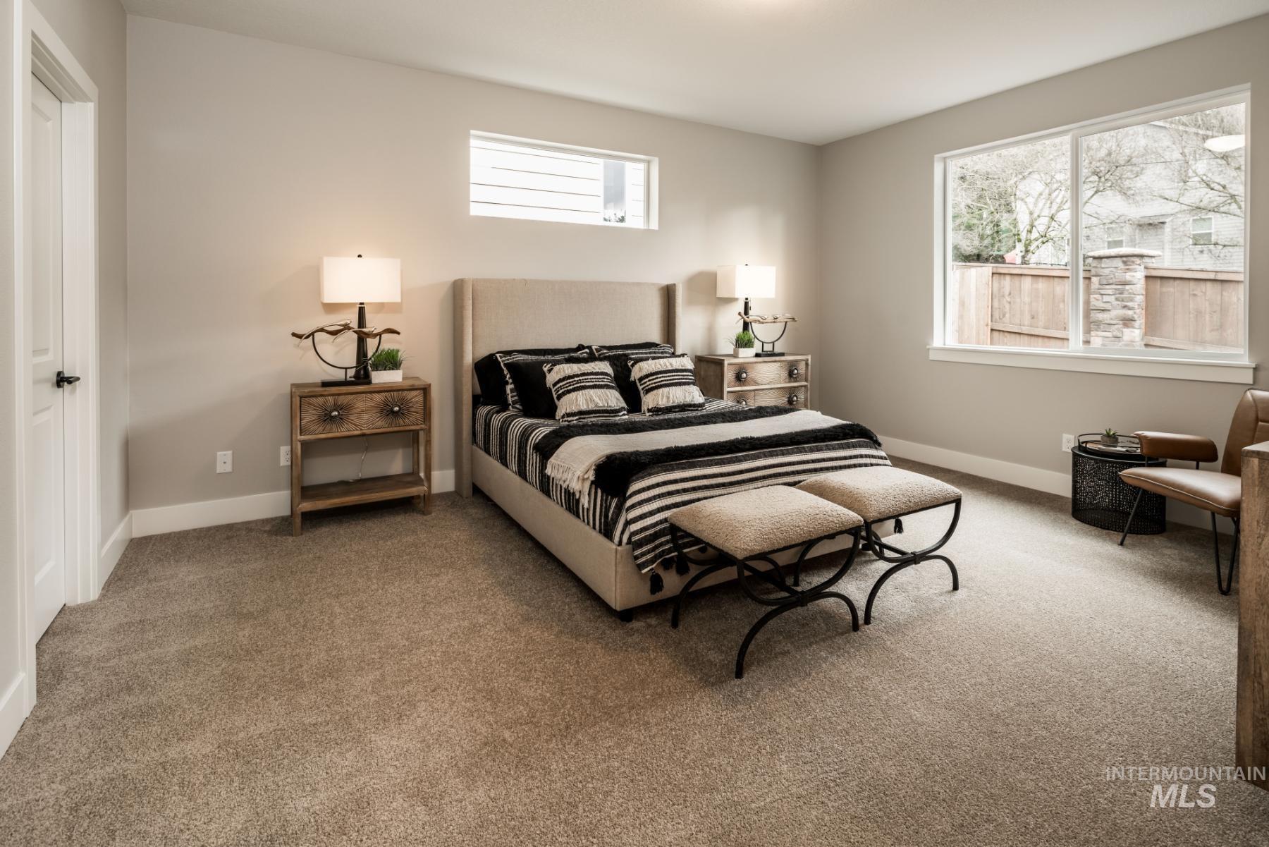 1279 West Malbar Street Meridian, ID 83646 - Photo 16 of 23 Carpeted bedroom featuring baseboards