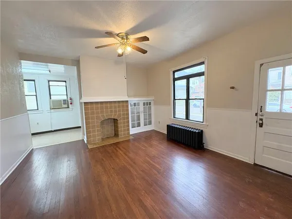a view of livingroom with hardwood floor and window