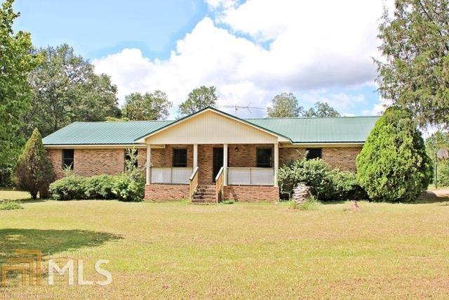2190 Davis Academy Road Rutledge, GA 30663 - Photo 1 of 1 a front view of house with yard and green space