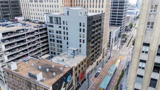 a view of a building with a street