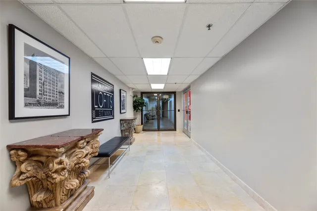 a view of a balcony with wooden floor