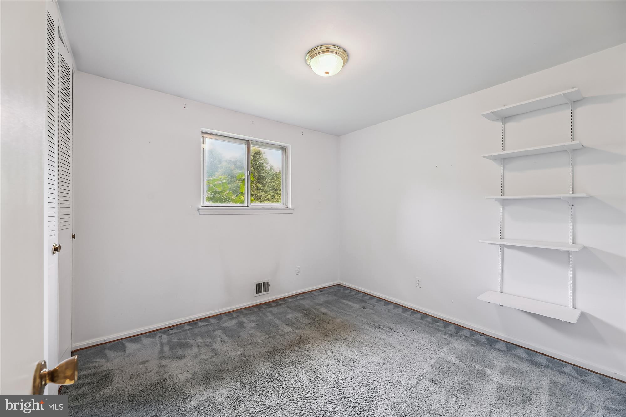 8621 Cromwell Drive Springfield, VA 22151 - Photo 19 of 41 Bedroom 3 - hardwood under the carpet
