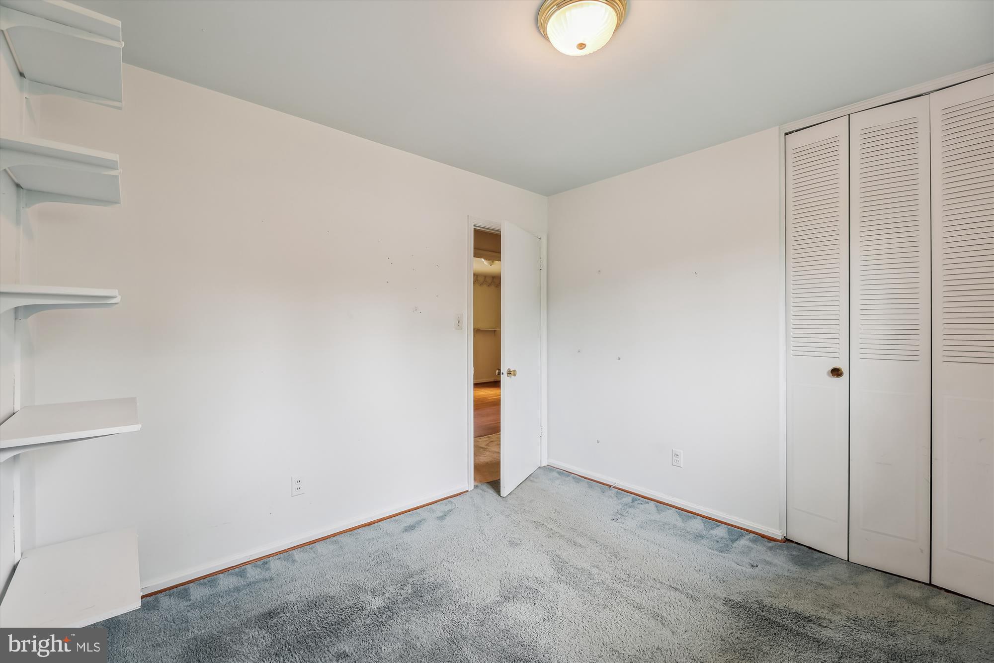8621 Cromwell Drive Springfield, VA 22151 - Photo 20 of 41 Bedroom 3 - hardwood under the carpet