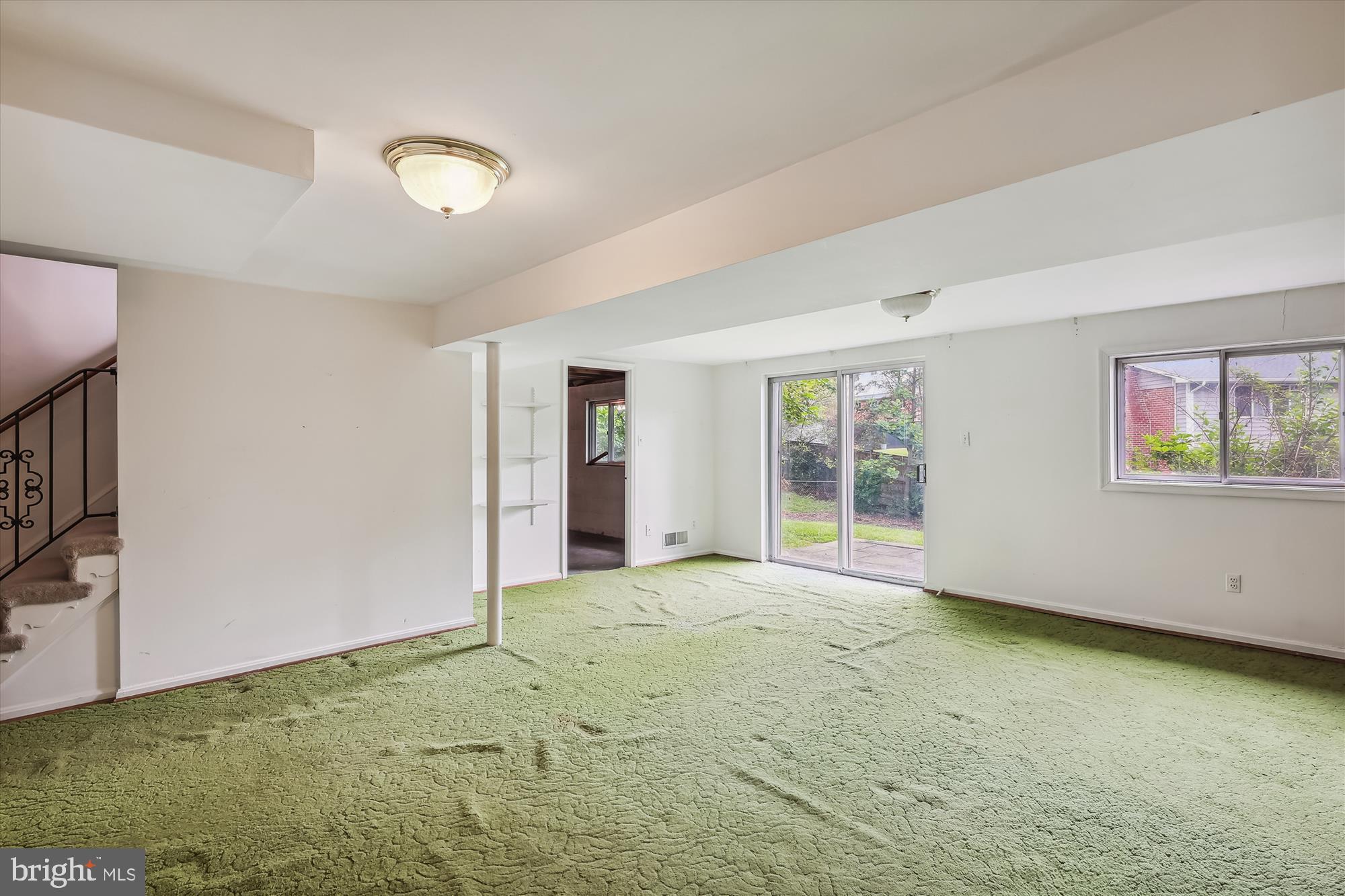 8621 Cromwell Drive Springfield, VA 22151 - Photo 24 of 41 Walk out to the rear yard from the rec room