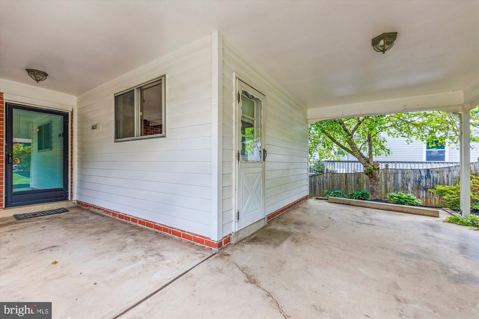8621 Cromwell Drive Springfield, VA 22151 - Photo 36 of 41 Carport - doo leads to the kitchen