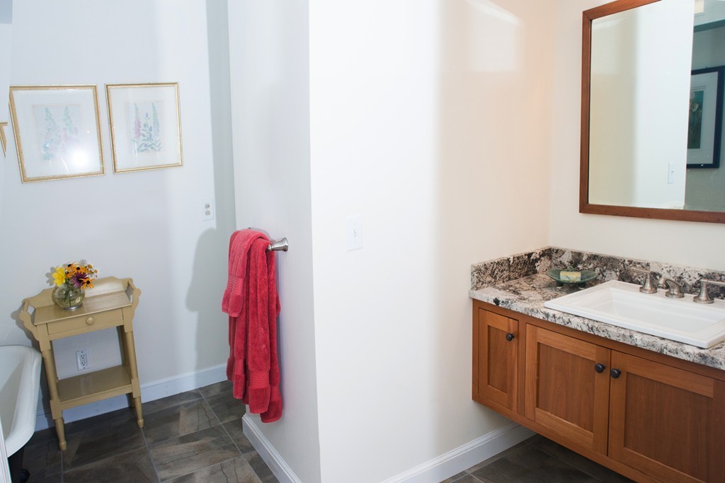 225 Littleton County Road Harvard, MA 01451 - Photo 10 of 30 a bathroom with a sink and a mirror