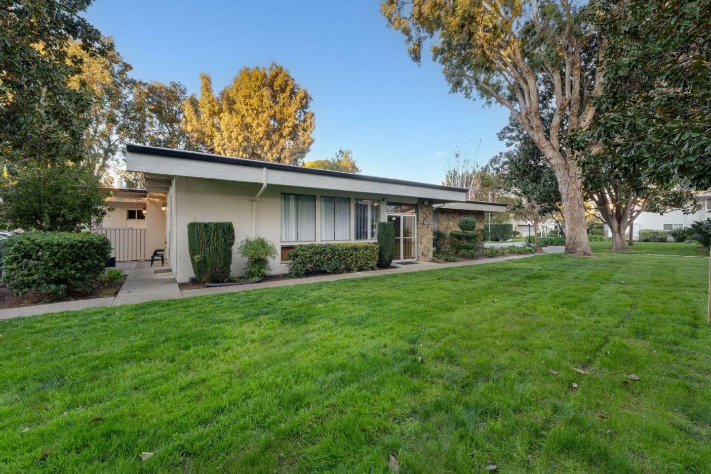 14225 Lora Drive, Unit 59 Los Gatos, CA 95032 - Photo 15 of 20 a front view of house with yard and green space