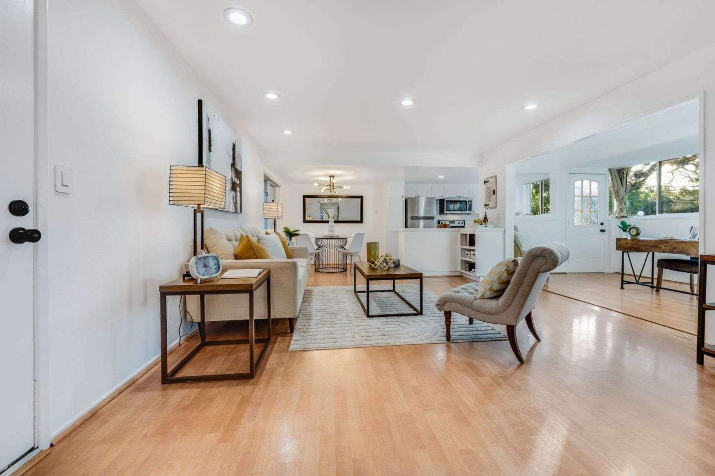 14225 Lora Drive, Unit 59 Los Gatos, CA 95032 - Photo 3 of 20 a living room with furniture and a wooden floor