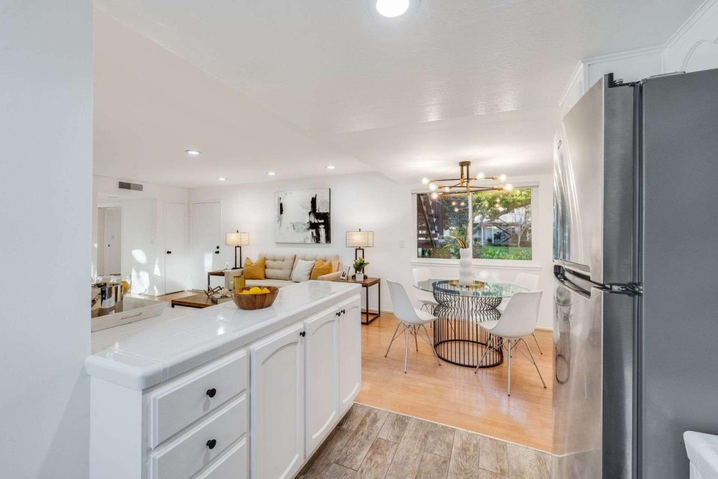 14225 Lora Drive, Unit 59 Los Gatos, CA 95032 - Photo 10 of 20 a view of a kitchen and living room
