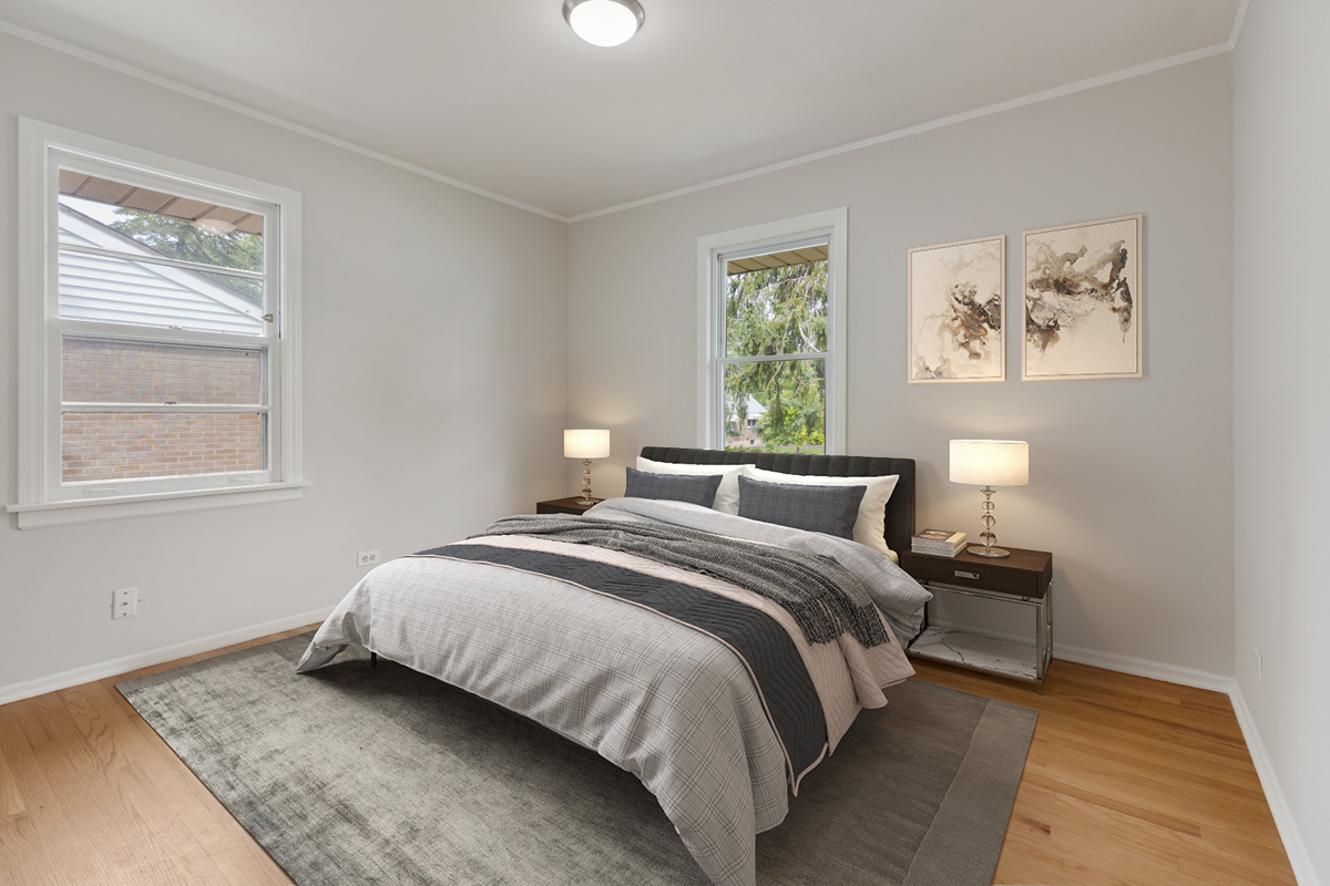 1528 Herbert Avenue Berkeley, IL 60163 - Photo 11 of 25 a bedroom with a bed and a window