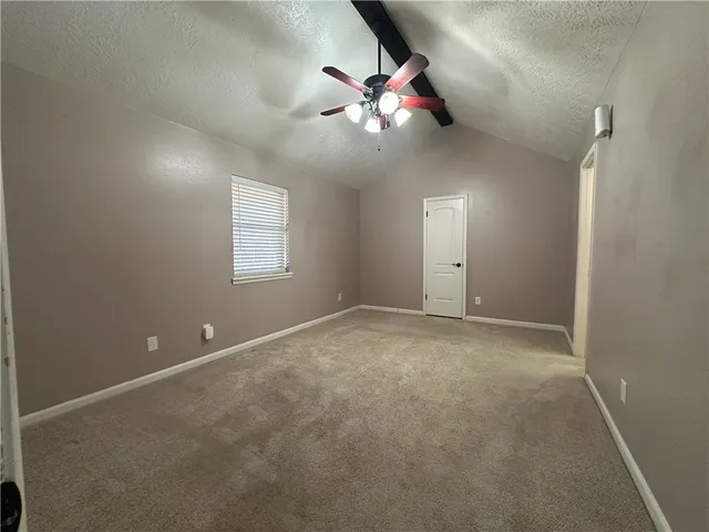 en view of an empty room with a window