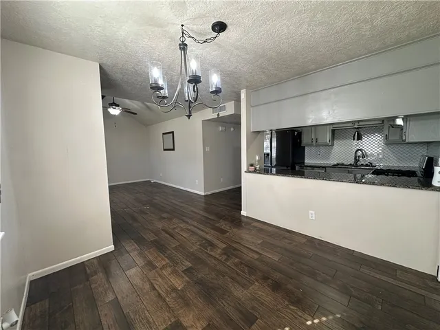 a view of a kitchen and a sink